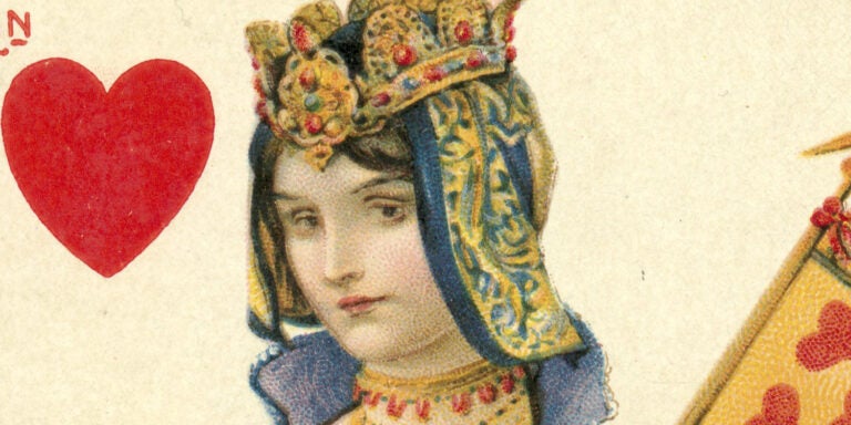 The top of a playing card that depicts the head and a red heart representing the queen of hearts.
