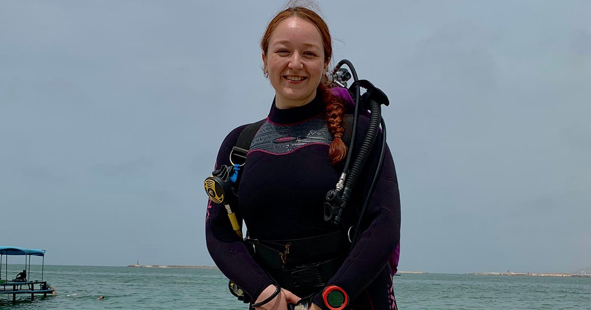 Katelyn Rollins in her scuba gear ready to dive at the Eastern Harbor in Egypt